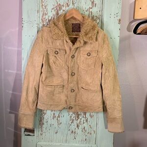 Women’s True Grit tan suede jacket with a faux fur lining and pockets